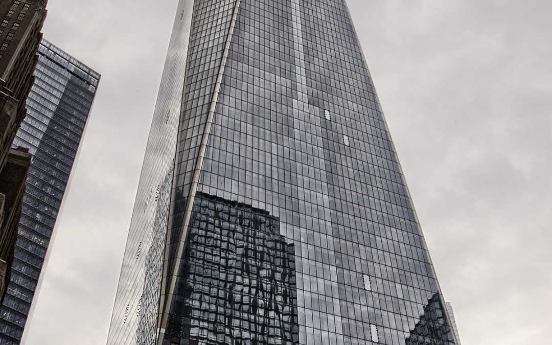 One World Trade Center, Skyscraper, New York City, World Trade Center - Manhattan, Building Exterior, Blue, New York State, City, Low Angle View, No People, Architecture, Clear Sky, Color Image, Day, Development, Glass - Material, International Landmark, Modern, Outdoors, Photography, Sunbeam, Travel, USA, Vertical